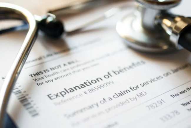 Stock art of a close up a document that reads "Explaination of benefits"