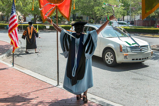 Decorative image of graduating students