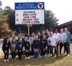 A group of students outside of St. Stephen's Clinic.