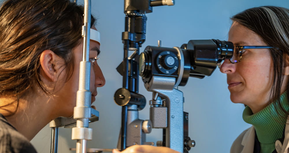 Dr. Perry analyzes a patient before cataract surgery at MUSC Health Storm Eye Institute. 