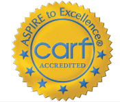 Commission on Accreditation of Rehabilitation Facilities seal that reads Aspire to Excellence CARF Accredited