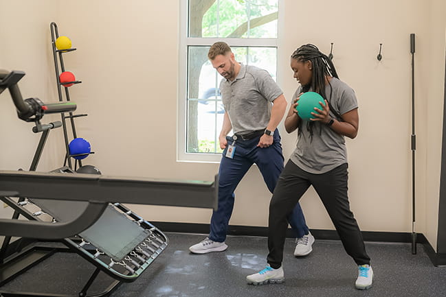 Mike Sole educating proper medicine ball exercises