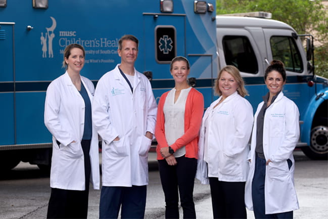Five members of the pediatric trauma team pictured in front of MUSC Children’s Health