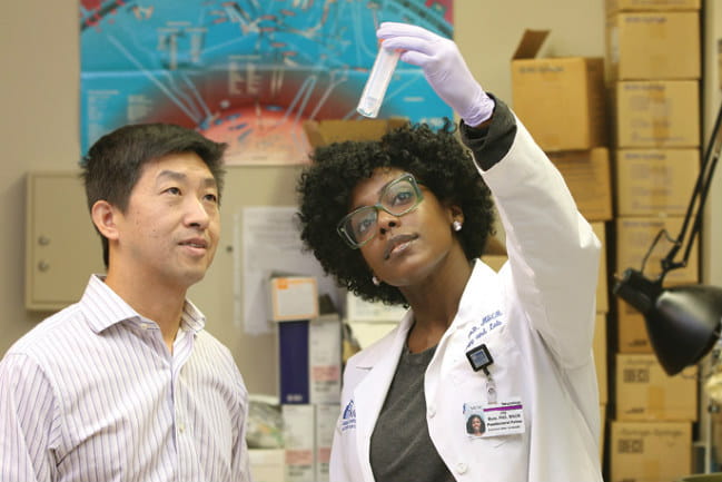 Image of Dr. Hongkuan Fan on the left and Dr. Joy Jones Buie on the right.