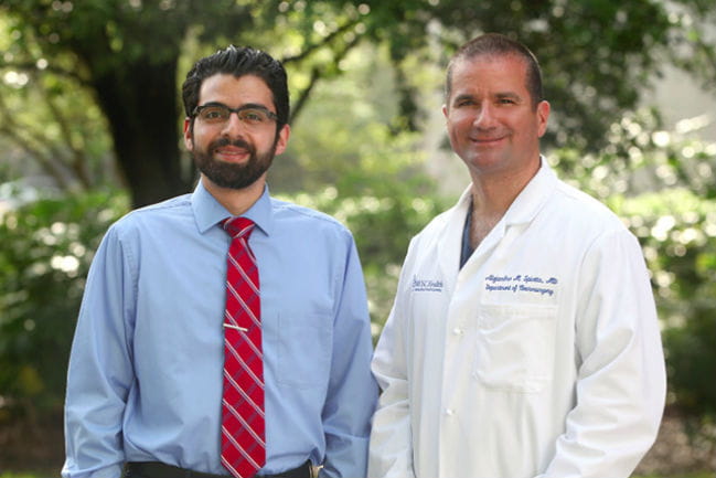  Dr. Spiotta (on right) worked with Dr. Alawieh 