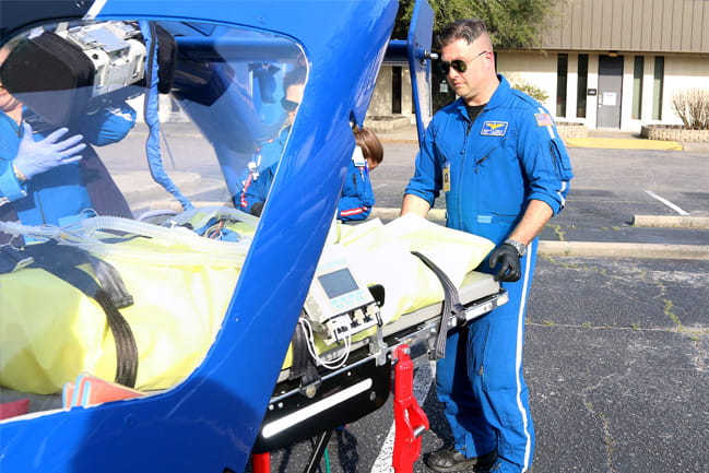 Bohuslav “Bob” Humplik serves as a pilot for the MEDUCARE Flight Team, which transfers patients by ambulance and helicopter 24/7.