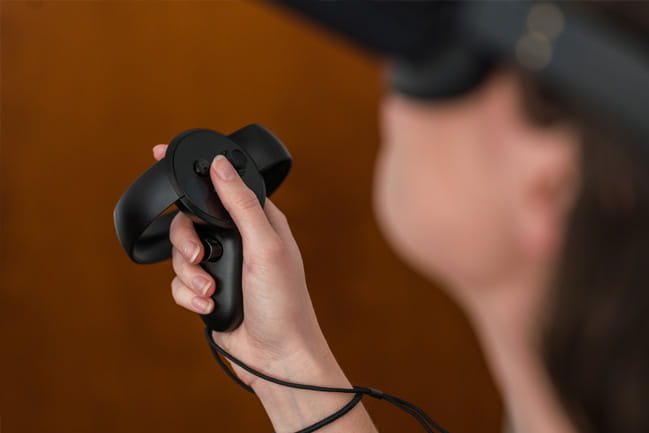 person holding virtual reality controller