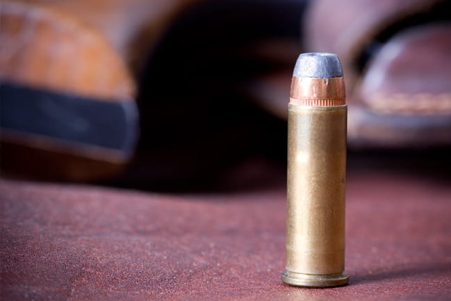 Bullet standing upright on a surface