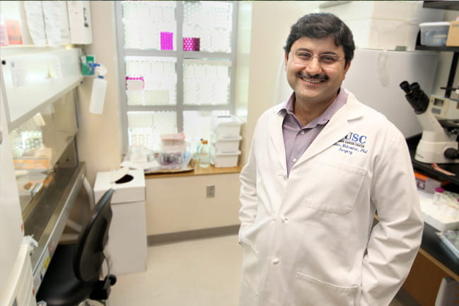 Cancer researcher Shikhar Mehrotra, Ph.D., in his lab