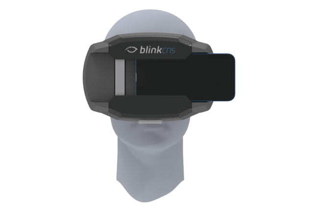 Smartphone slid into blink reflex detection device, as seen from the front on mannequin head