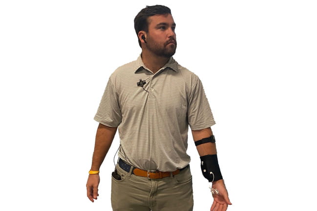 patient wearing Bio Ware device on wrist and arm