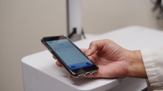 Doctor holding cell phone