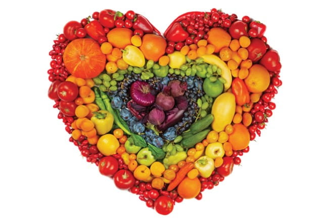 vegetables arranged in the shape of a Valentine heart.