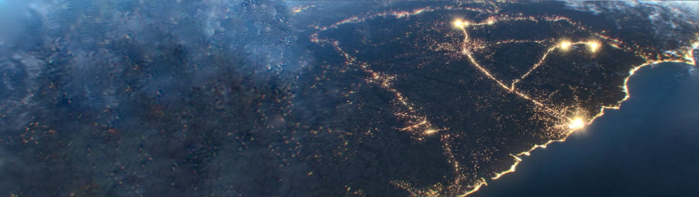 Decorative image of an artists rendering of South Carolina as seen from space at night.