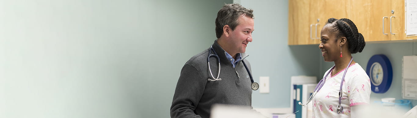 Two care providers consulting