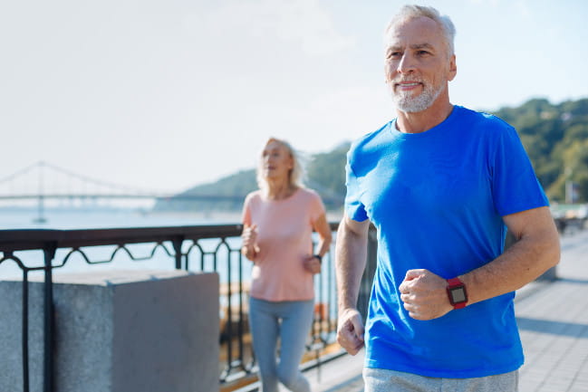 Man and woman jogging.