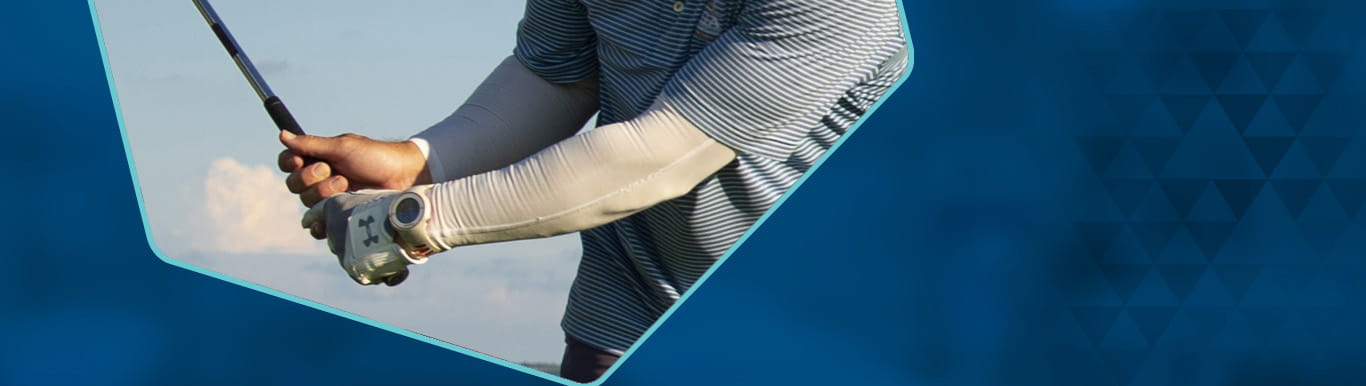 Person swinging golf club