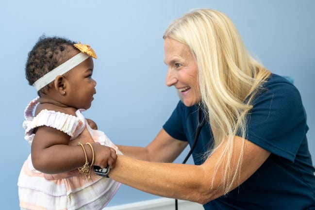 Jenny Nordby, M.D. with a patient