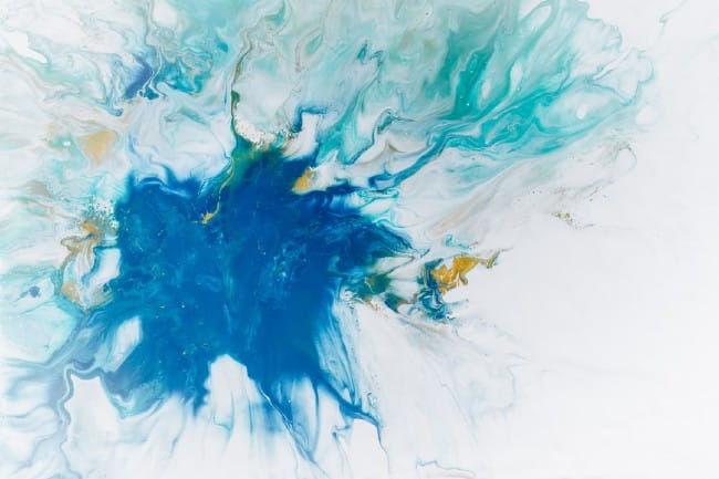 Abstract image of blue hues against a white backdrop.