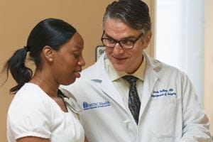 Dr. Derek DuBay talking to a patient