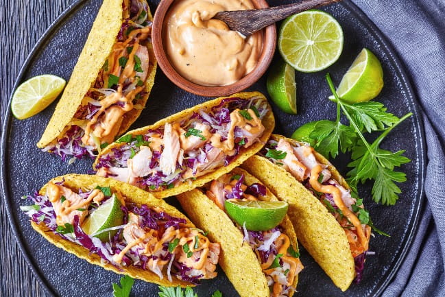 A plate of delicious salmon tacos.
