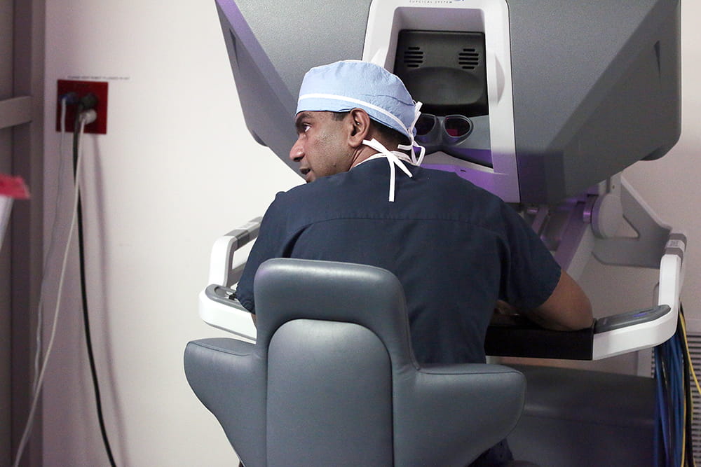 A doctor uses a robotic surgery instrument 
