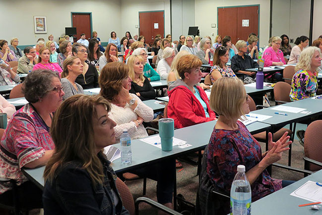 More than 80 nurses brush up on how to pack dressing into a severe wound.