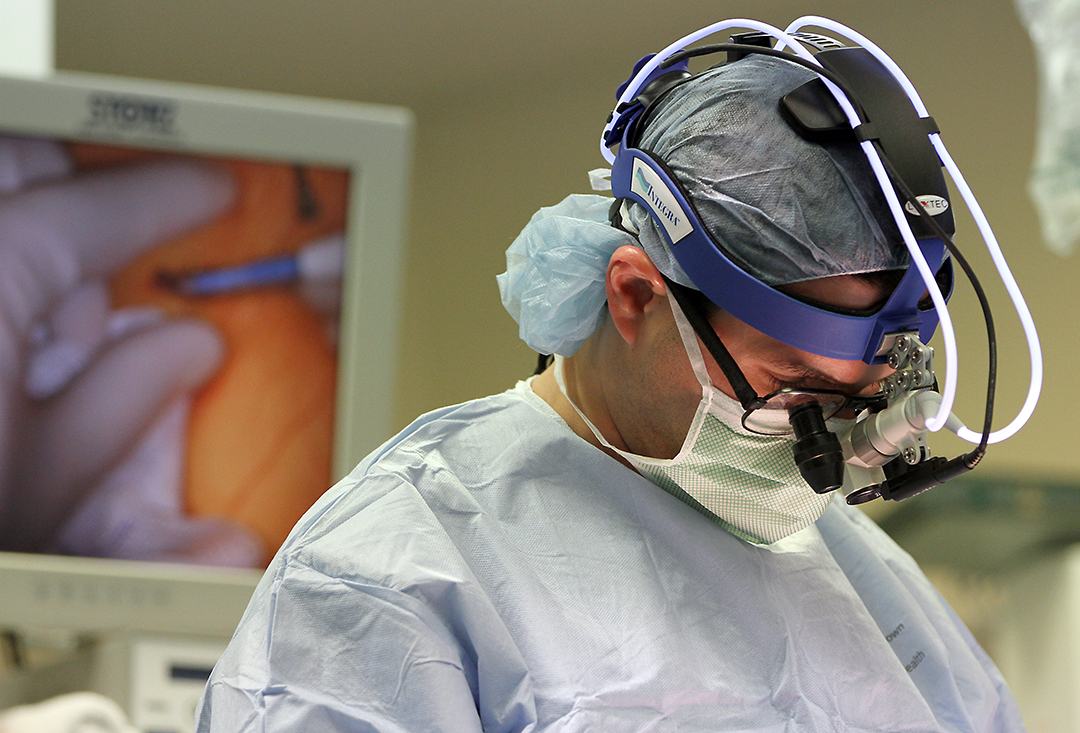 Dr. Minoo Kavarana performs a heart transplant, one of the 26 adult procedures performed by staff last year.