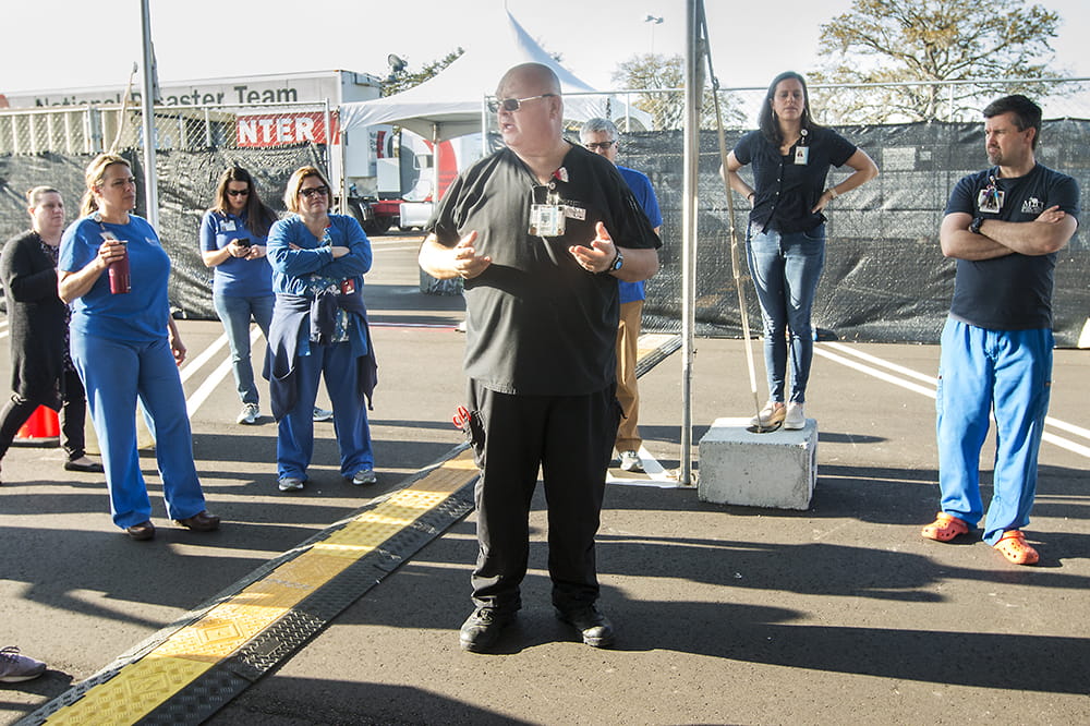 Johan Zamoscianyk speaks to a group of health care workers