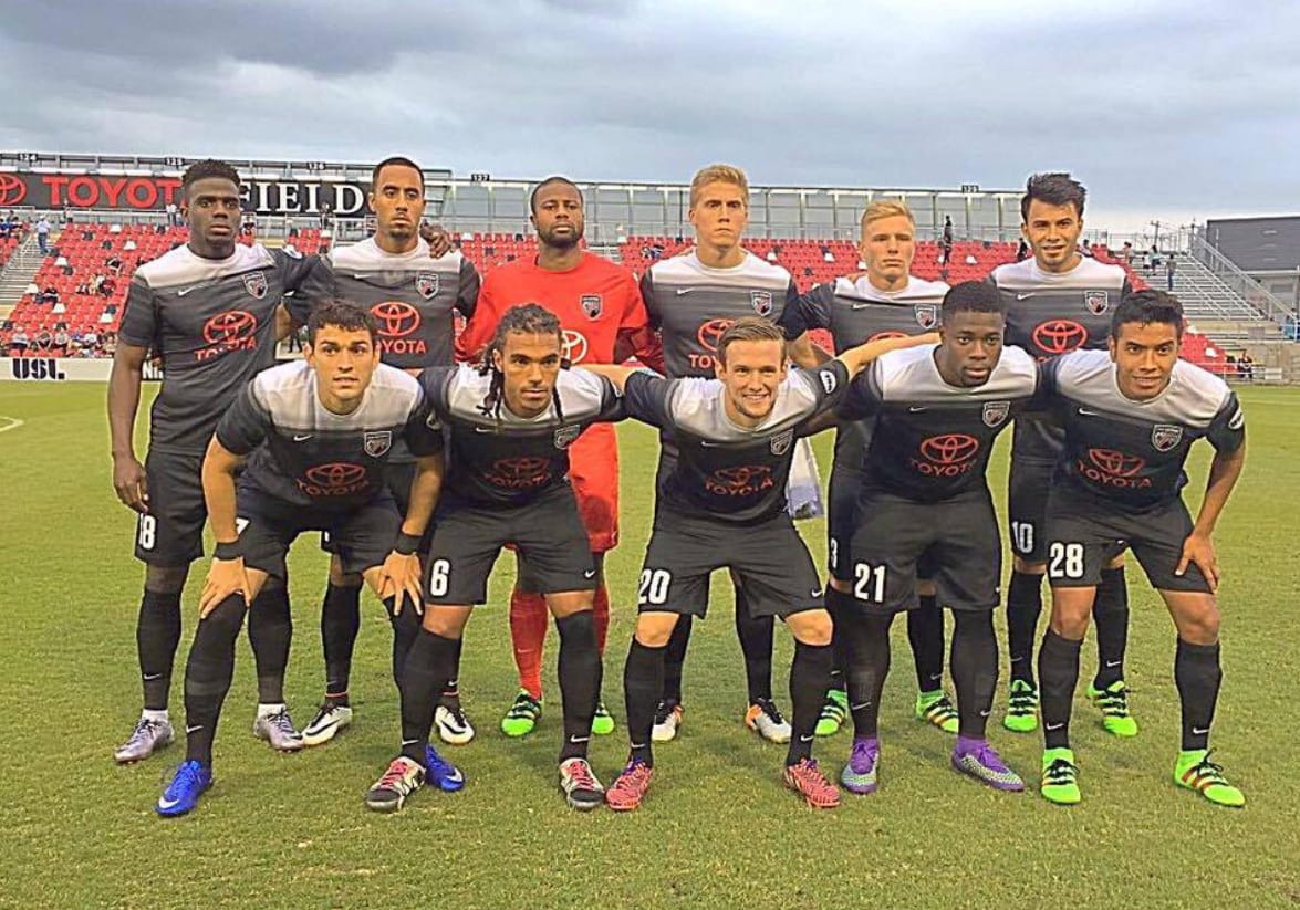 Victor Araujo with his San Antonio FC teammates on the field after a game