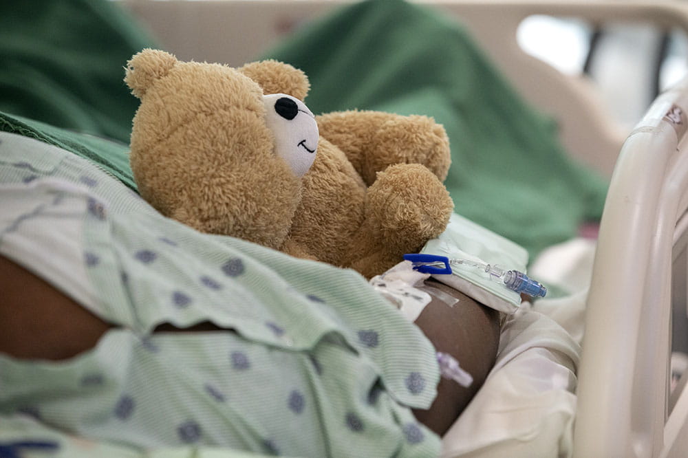 A 10-year-old girl from Conway named Tiera holds a teddy bear. Her mother asked that her last name not be used.