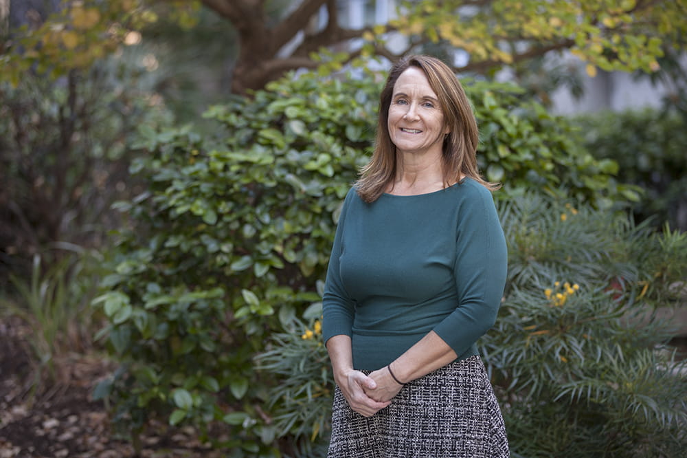 Dr. Jane Joseph of MUSC standing in a garden