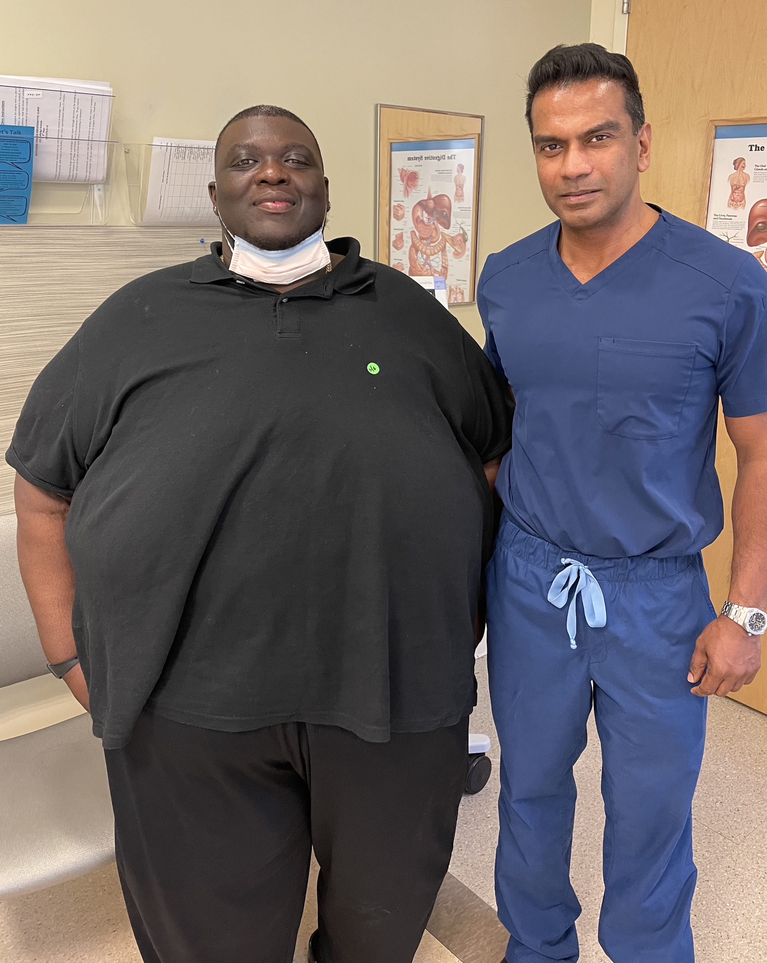 Patient standing with surgeon