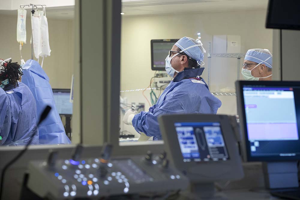 View through a control room window of a surgeon in a new endovascular suite.