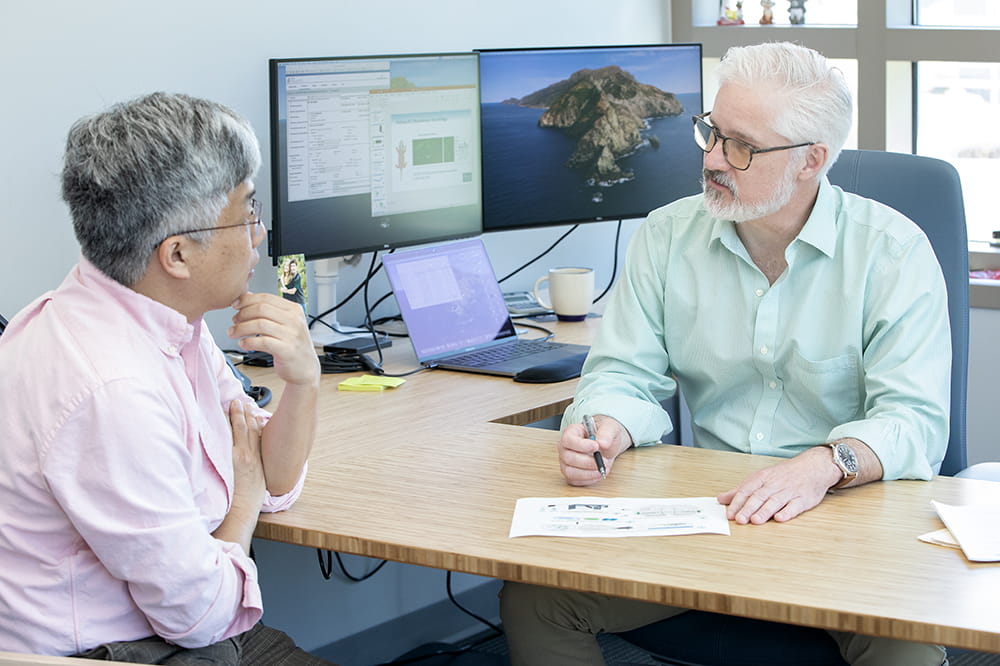 Dr. Makoto Taniguchi (left) and Dr. Christopher Cowan (right)