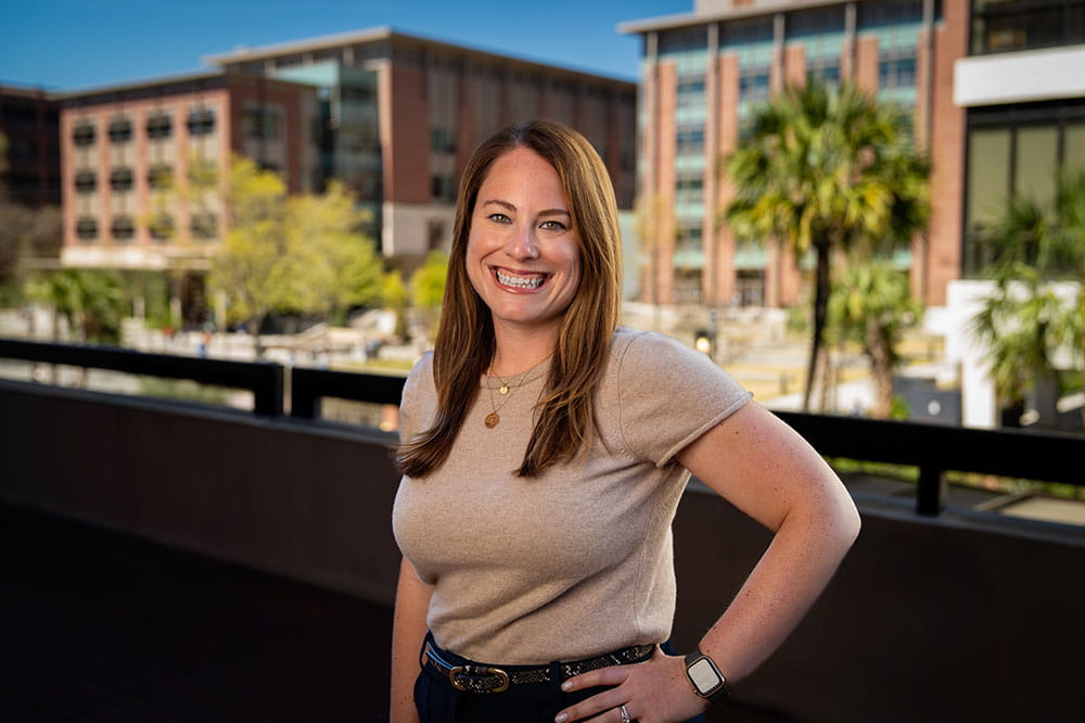 portrait of woman with the MUSC campus behind her